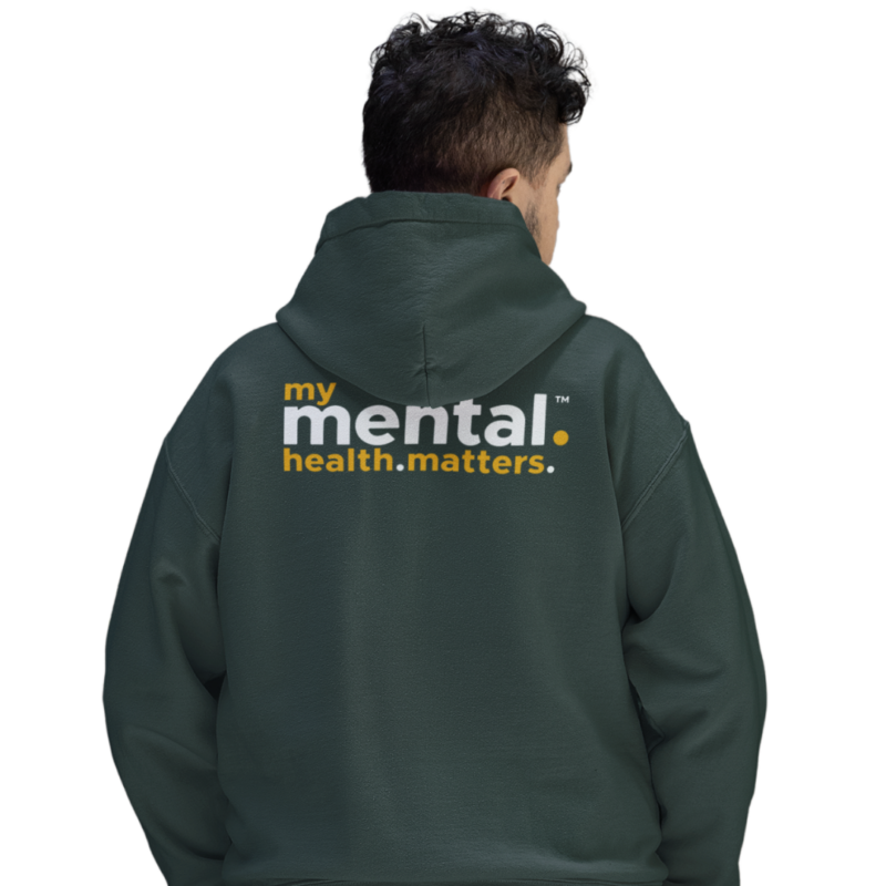 Person wearing hoodie with 'mental health matters' text.