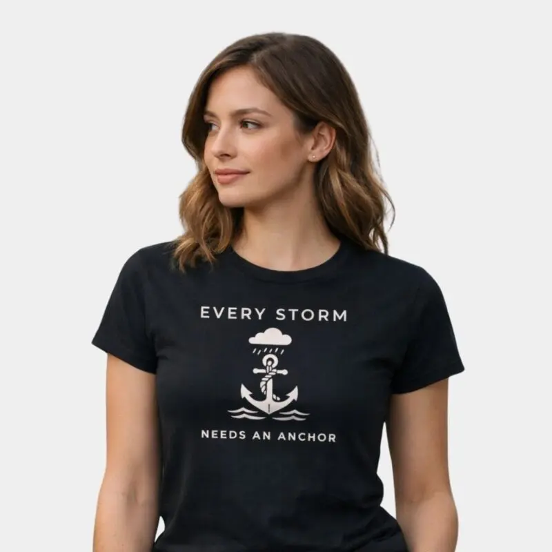 Woman in anchor-themed motivational T-shirt.