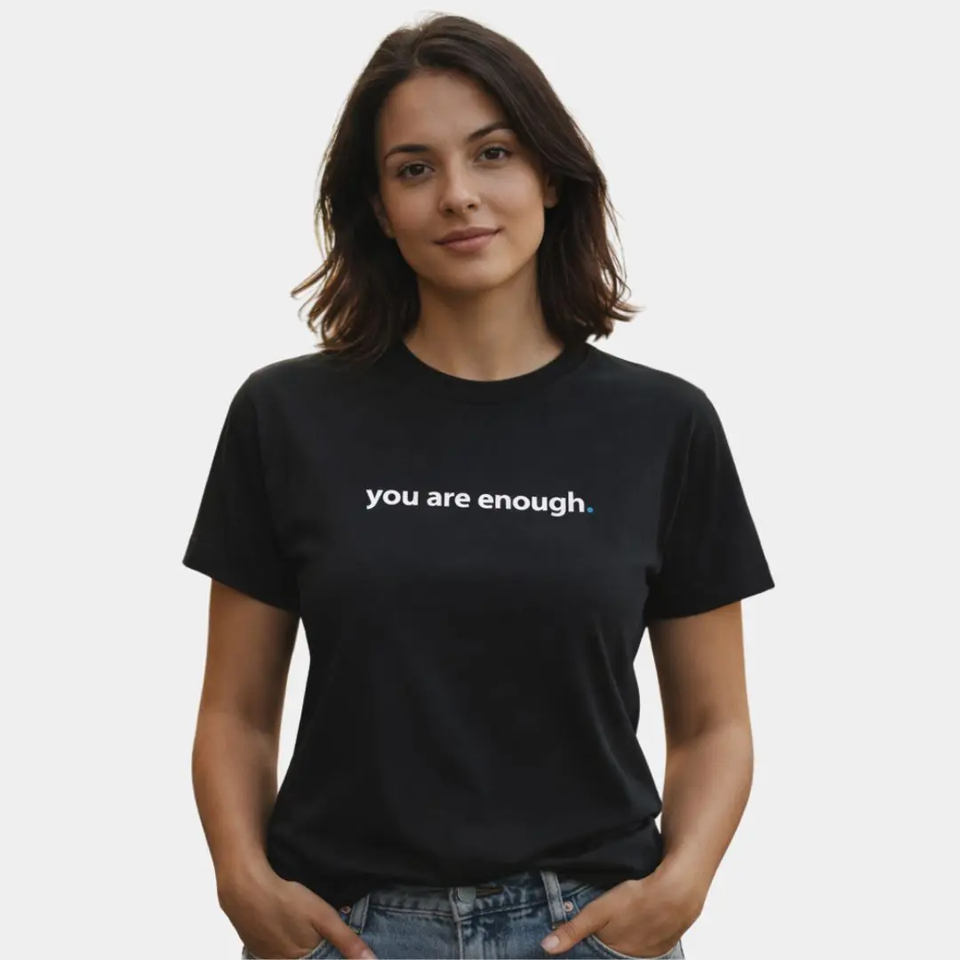 Person wearing 'you are enough' t-shirt