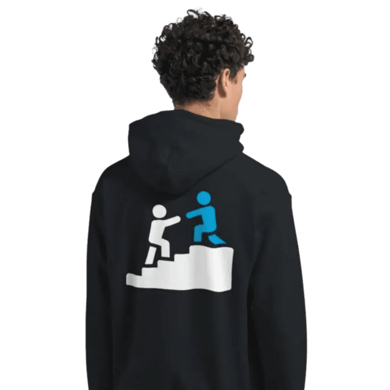 Person wearing hoodie with helping graphic on back.